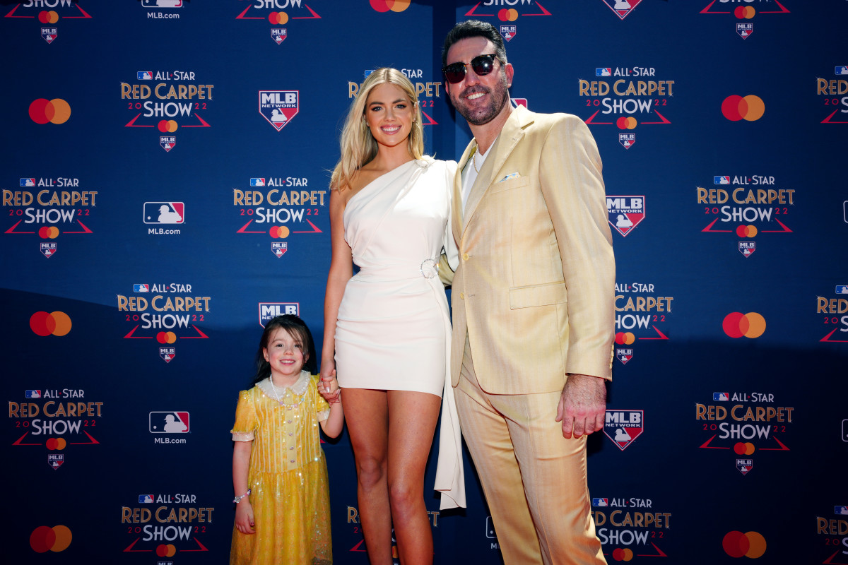 Kate Upton and husband Justin Verlander of the Houston Astros pose for a photo with their daughter during the All-Star Red Carpet Show at L.A. Live on Tuesday, July 19, 2022 in Los Angeles, California. 